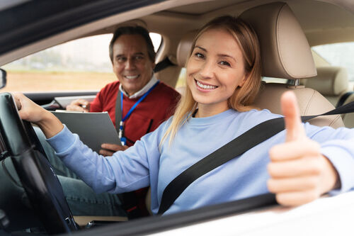 woman-male-driving-instructor-driving-test woman-male-driving-instructor-driving-test